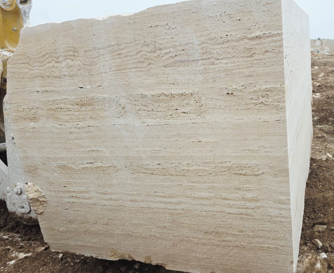 Travertino Light: warm beige limestone with characteristic natural voids — classic Roman stone